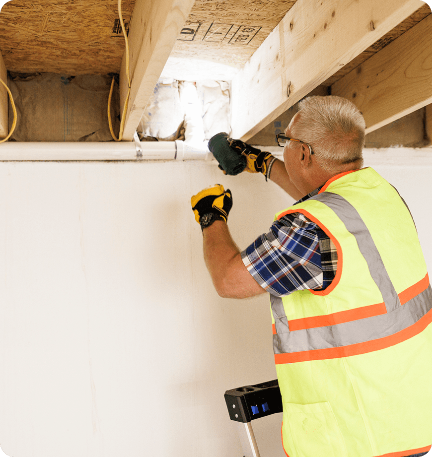 Professional technician performing a home energy evaluation in Canby.