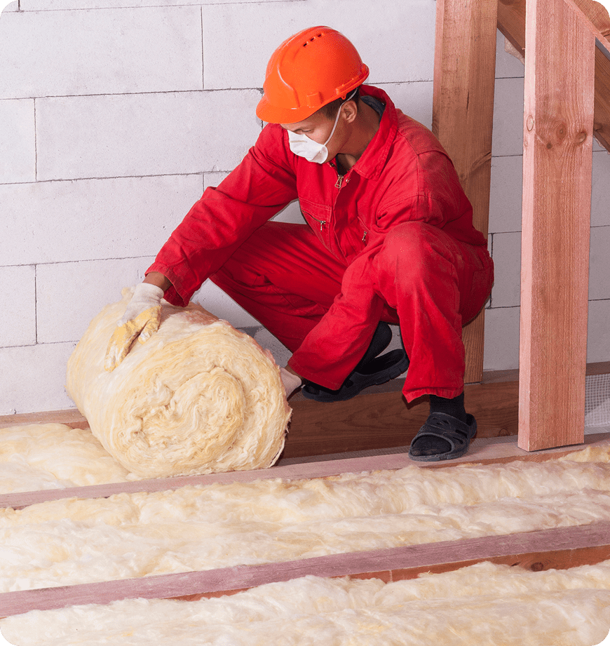 Worker handling insulation installation for a client's home.