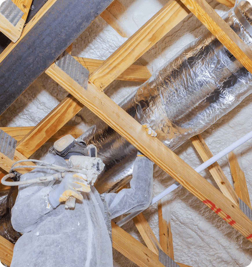 A spray foam specialist holding a heat testing device.