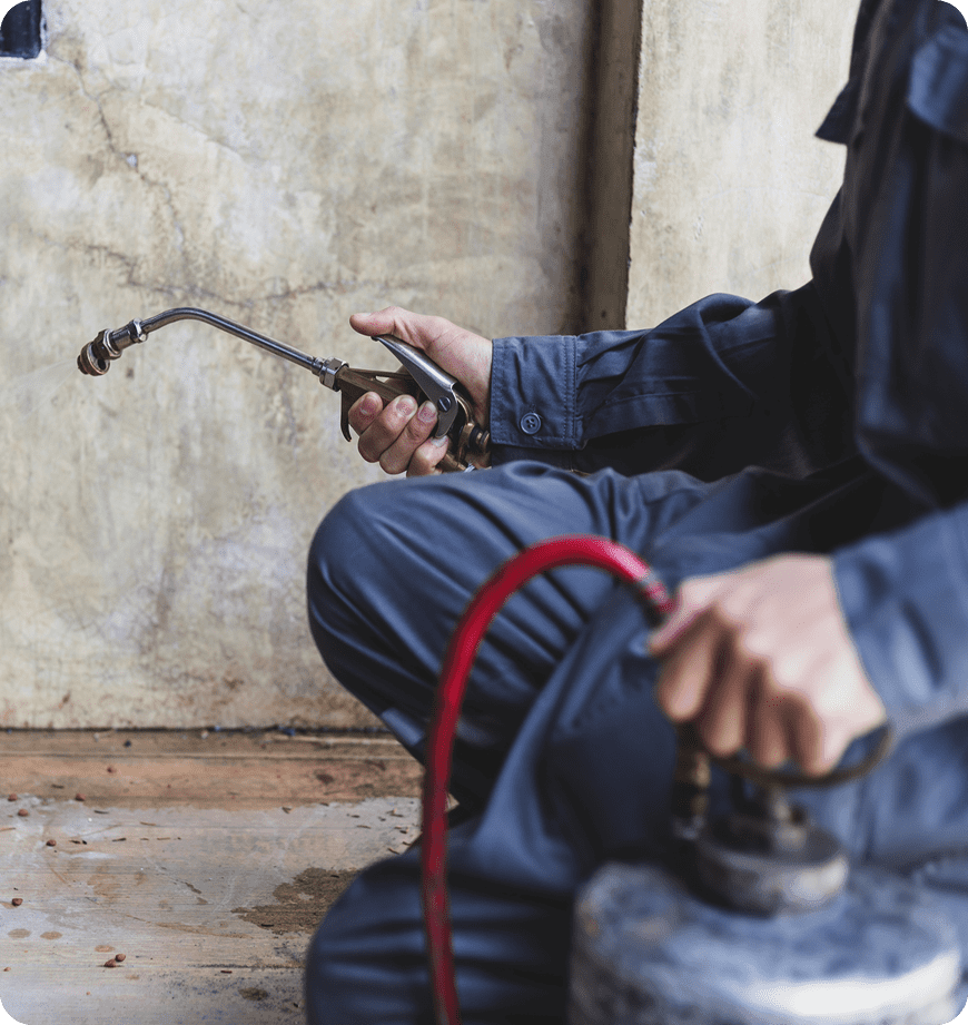 Professional technician performing comprehensive crawl space pest control in Eugene, OR.
