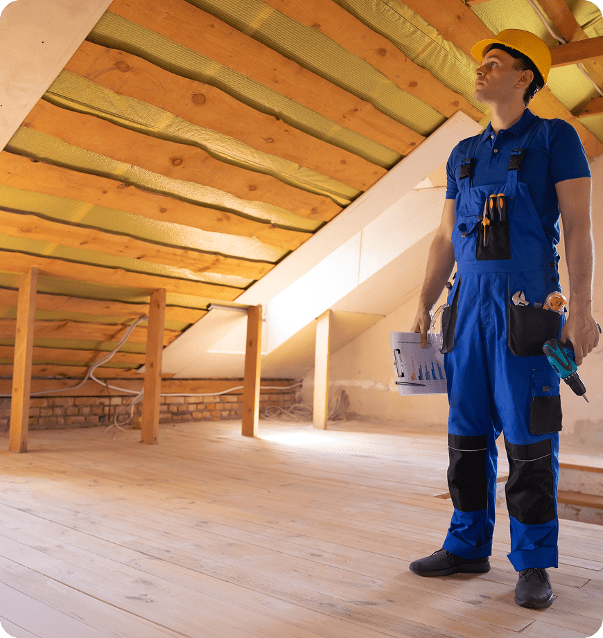 A specialist conducting a thorough quality check on a newly installed attic solution.
