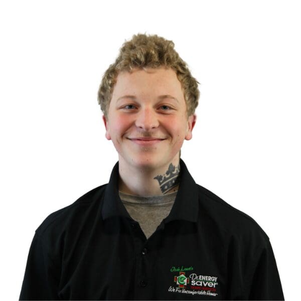 Smiling person wearing a black polo shirt.