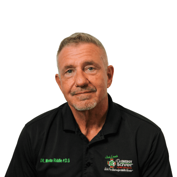 Headshot of man in black polo shirt