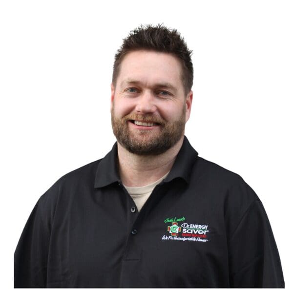 Smiling bearded man wearing company logo polo